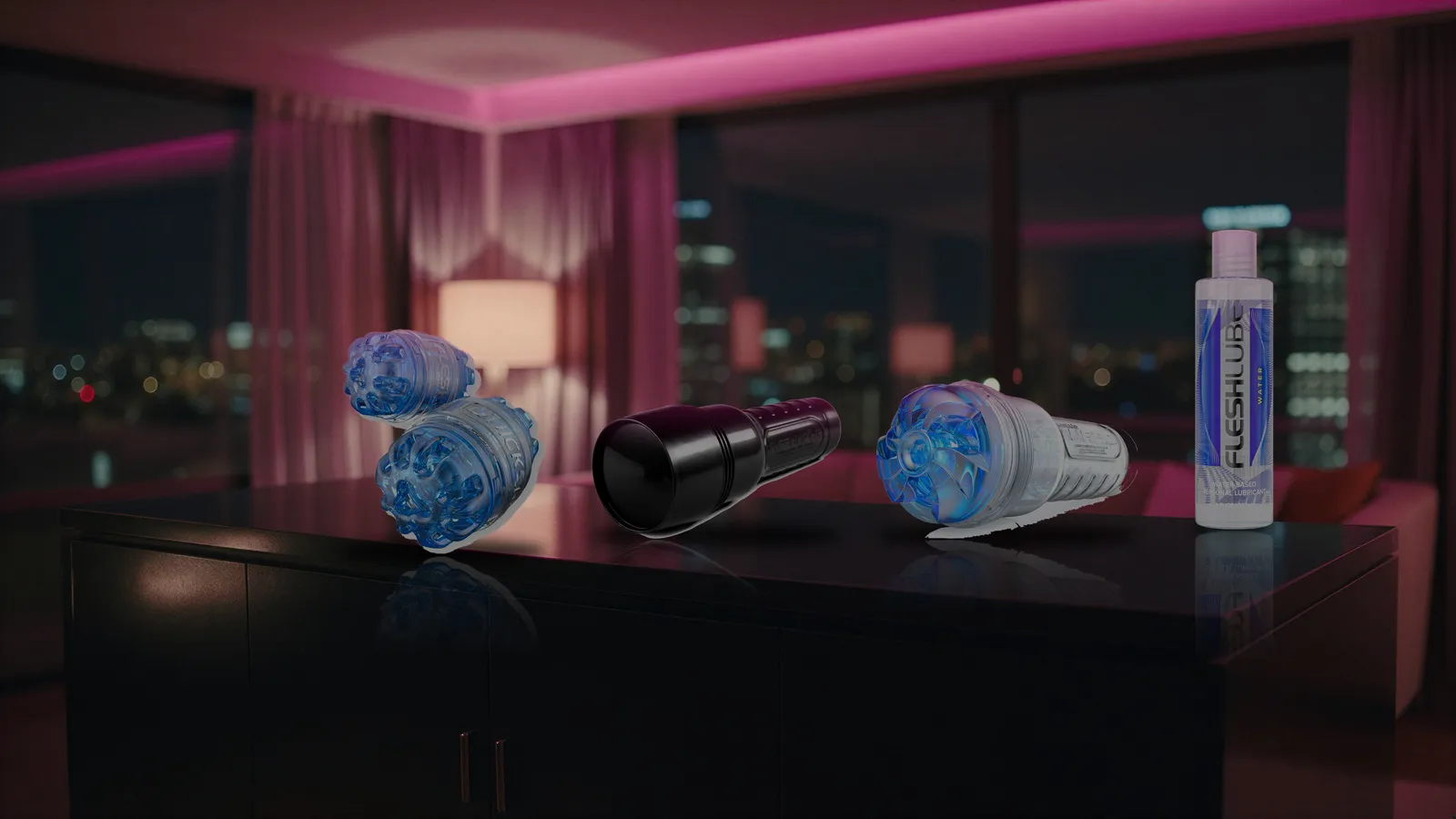 Quickshot Turbo, a closed black Fleshlight case, a Turbo Thrust sleeve, and Fleshlube Water in a row on a dark hotel dresser under pink neon